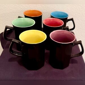 6 Black octagonal mugs with different colors. 4.5”H